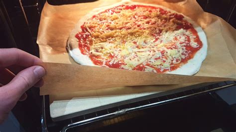 can you put parchment paper on a pizza stone